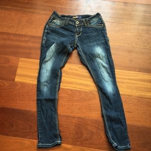 Faded low-rise skinny jeans contrast stitching